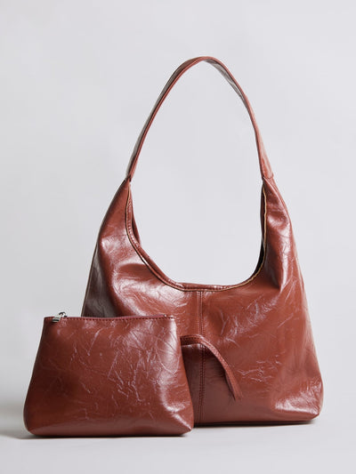 Bolso de mano Scarlett de piel desgastada