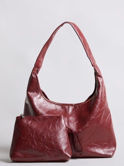 Bolso de mano Scarlett de piel desgastada