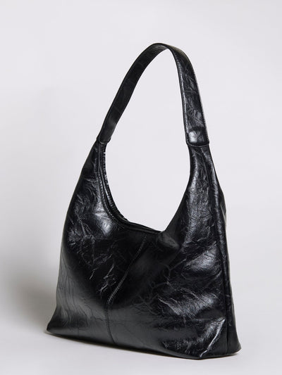 Bolso de mano Scarlett de piel desgastada