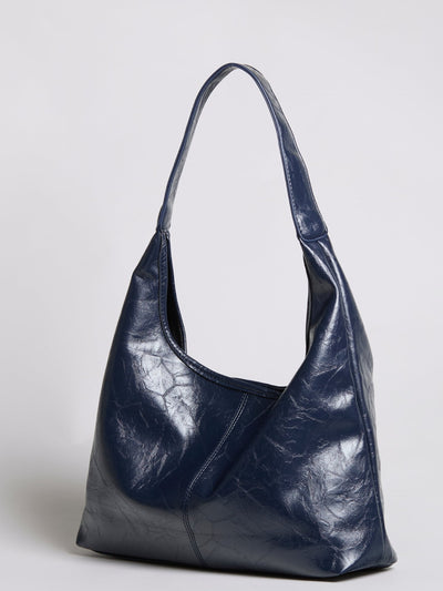 Bolso de mano Scarlett de piel desgastada