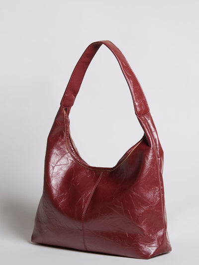 Bolso de mano Scarlett de piel desgastada