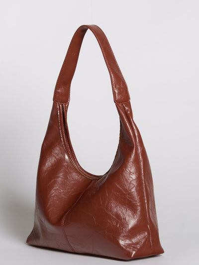 Bolso de mano Scarlett de piel desgastada